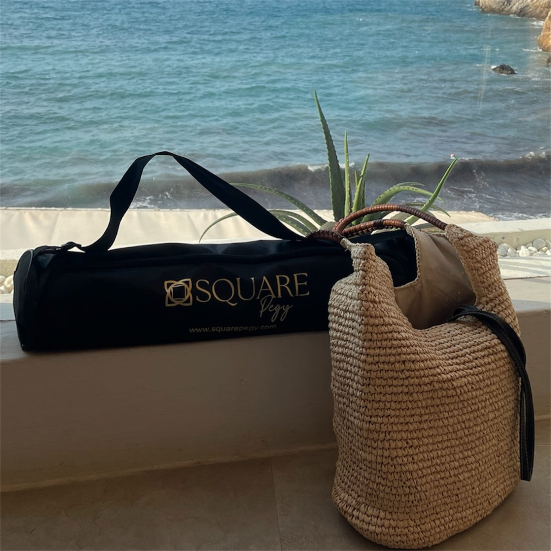 Black and gold yoga mat carry bag with adjustable shoulder strap, fits all standard mats
